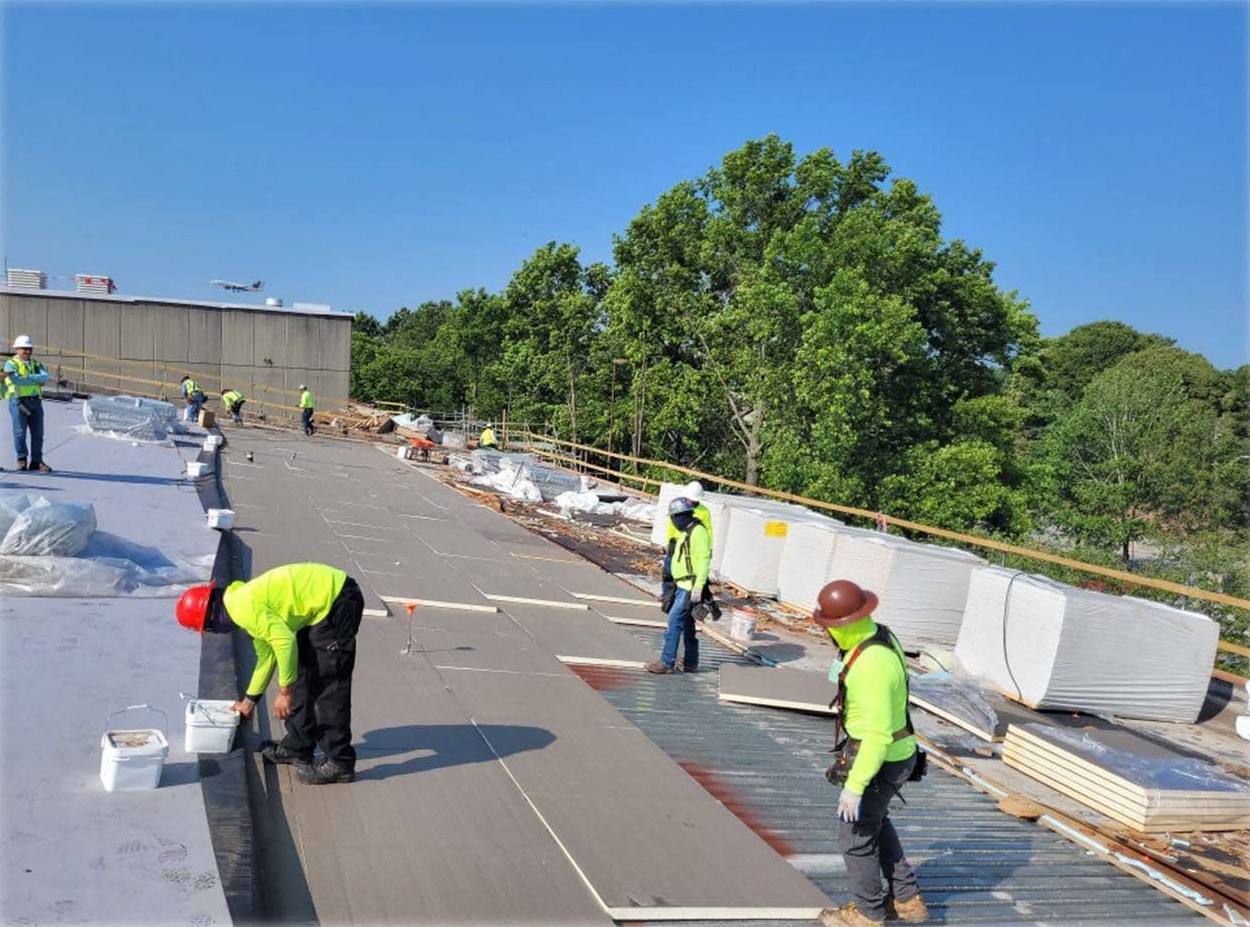 23_0526-South Yard Rail Facility Roof Replacement Crews at Work Cropped